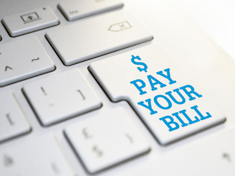 button on computer keyboard reads $ Pay Your Bill